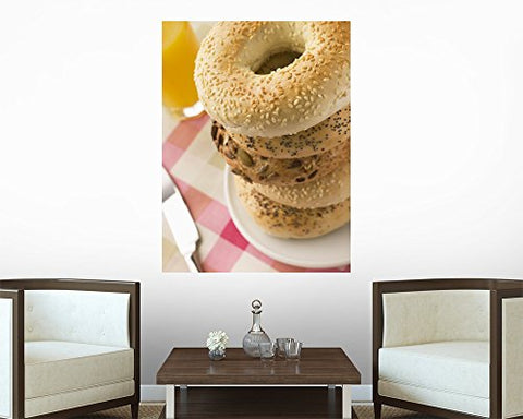 Wallmonkeys FOT-8267830-30 WM210743 Stack of Seeded Bagels with a Glass of Orange Juice Peel and Stick Wall Decals (30 in H x 23 in W), Medium-Large